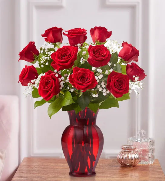 One Dozen Long Stem Red roses in a red vases