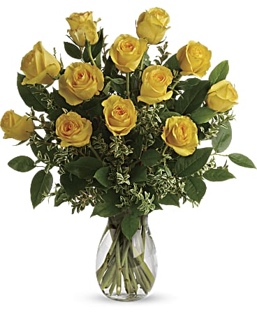 One dozen yellow roses in a vase